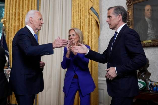 Joe Biden Pardons His Son Hunter File photo - President Joe Biden greets his son Hunter Biden after addressing the nation from the Oval Office of the White House in Washington, DC, USA, Wednesday, July 24, 2024, about his decision to drop his Democratic presidential reelection bid, as first lady Jill Biden watches. President Joe Biden has issued a full and unconditional pardon for his son Hunter - just weeks before he was set to be sentenced. Hunter, 54, was convicted of three firearm charges in June, marking the first criminal prosecution of a sitting US president s child. Photo by Evan Vucci Pool ABACAPRESS.COM Washington DC United States  Copyright: xPool ABACAx