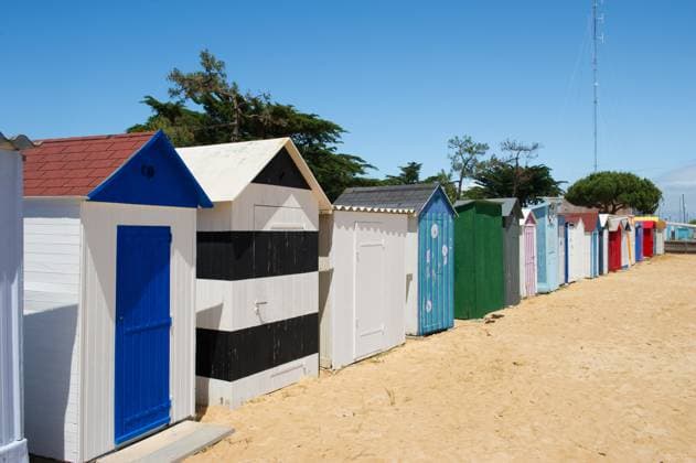Beach huts on island Oleron in France Colorful beach huts on the beach at Saint-Denis island d Oleron in France Copyright: xZoonar.com IvonnexWierinkx 7779345