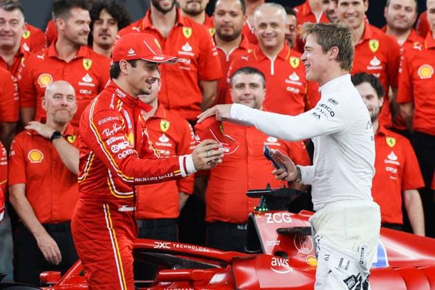 December 5, 2024, Abu Dhabi, United Arab Emirates: Charles Leclerc of Ferrari and Brad Pitt, actor playing Sonny Hayes, a driver of the fictional Apex APXGP F1 team in the upcoming F1 movie directed by Joseph Kosinski, are seen ahead of Formula 1 Abu Dhabi Grand Prix at Yas Marina Circuit on December 5th, 2024 in Abu Dhabi, United Arab Emirates. Abu Dhabi United Arab Emirates - ZUMAz156 20241205_zip_z156_045 Copyright: xBeataxZawrzelx
