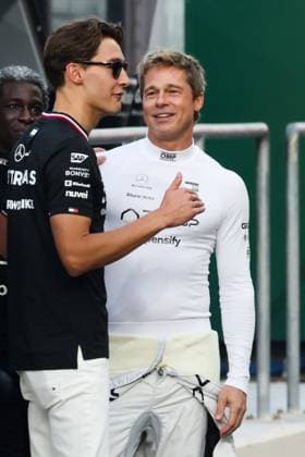 December 5, 2024, Abu Dhabi, United Arab Emirates: BRAD PITT, actor playing Sonny Hayes, a driver of the fictional Apex APXGP F1 team in the upcoming F1 movie and GEORGE RUSSELL of Mercedes are seen on a movie set ahead of Formula 1 Abu Dhabi Grand Prix at Yas Marina Circuit. Abu Dhabi United Arab Emirates - ZUMAz156 20241205_zip_z156_042 Copyright: xBeataxZawrzelx
