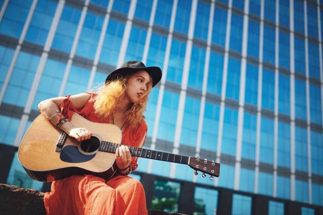 Creative Highlights Symbolbilder 783449156 City, woman and musician with guitar for playing, talent and creative skill for music with thinking. Urban, female person and guitarist with instrument for strumming strings, acoustic audio and sound. model released property released Copyright: xROWANxJORDAN(PTY)LTDx