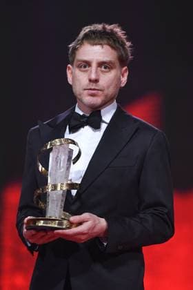 Marrakech Closing Ceremony Director Damian Kocur poses with the award for Under the Volcano during the Closing Ceremony during the 21st Marrakech International Film Festival in Marrakech, Morocco on December 07, 2024. Photo by Aurore Marechal ABACAPRESS.COM Marrakech Morocco  Copyright: xMarechalxAurore ABACAx