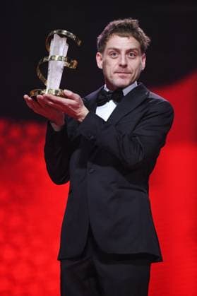 Marrakech Closing Ceremony Director Damian Kocur poses with the award for Under the Volcano during the Closing Ceremony during the 21st Marrakech International Film Festival in Marrakech, Morocco on December 07, 2024. Photo by Aurore Marechal ABACAPRESS.COM Marrakech Morocco  Copyright: xMarechalxAurore ABACAx