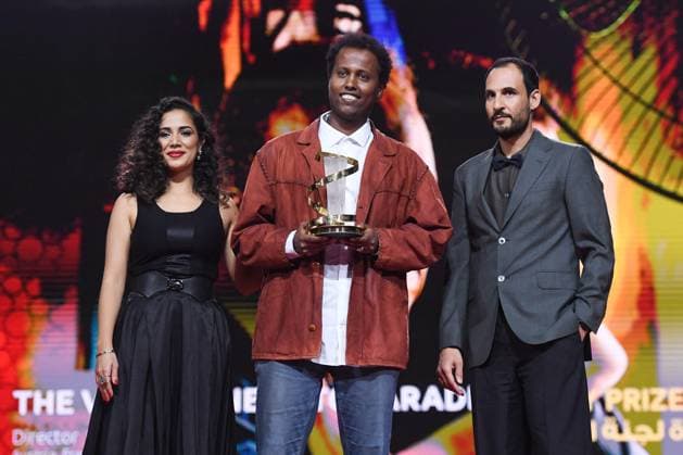 Marrakech Closing Ceremony Nadia Kounda, Director Mo Harawe receives the award for The village next to Paradise and Ali Abbasi during the Closing Ceremony during the 21st Marrakech International Film Festival in Marrakech, Morocco on December 07, 2024. Photo by Aurore Marechal ABACAPRESS.COM Marrakech Morocco  Copyright: xMarechalxAurore ABACAx