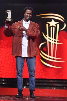Marrakech Closing Ceremony Director Mo Harawe receives the award for The village next to Paradise attending the Closing Ceremony during the 21st Marrakech International Film Festival in Marrakech, Morocco on December 07, 2024. Photo by Aurore Marechal ABACAPRESS.COM Marrakech Morocco  Copyright: xMarechalxAurore ABACAx