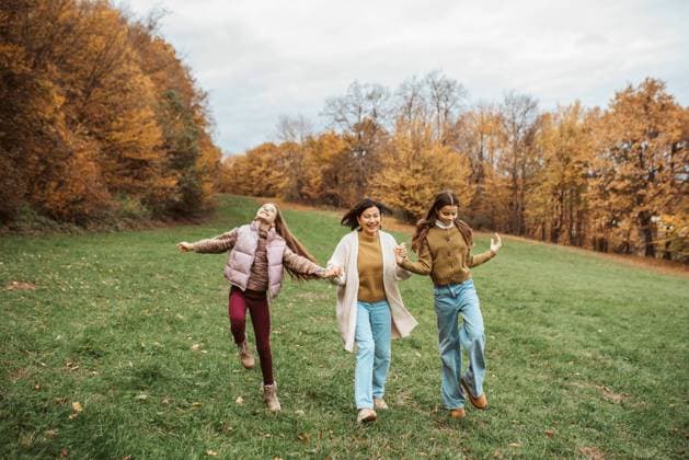Grandmother spending time with granddaugters, walking in the nature. Multigenerational family concept. Grandmother spending time with granddaugters, walking in the nature. Multigenerational family. model released