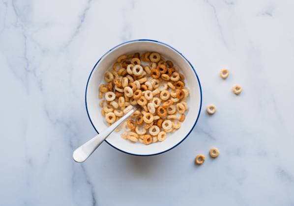 Bowl of cheerios breakfast cereal in milk on white marble. Kingston, Ontario, Canada R_DOHO241205-1597109-01
