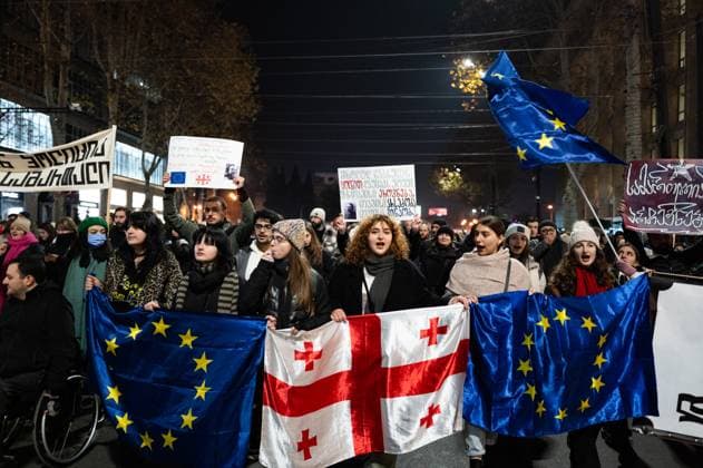 News: Bilder des Jahres 2024, News 12 Dezember News Themen der Woche KW50 News Bilder des Tages Georgians Continue To Demonstrate In Large Numbers In Tbilisi Georgia pro-Europe demonstrators hold Georgian and European flags during a protest against the Government s postponement of European Union accession talks until 2028, outside the Parliament in central Tbilisi, Georgia, on December 11, 2024. Georgia pro-Europe protests approach their third week on December 11, 2024, as defiant protesters keep pressure on the government amid growing international condemnation of police violence and Tbilisi s drift from its European path. Tbilisi Georgia  Copyright: xJeromexGillesx originalFilename: chobeaux-georgiap241211_npWqV.jpg