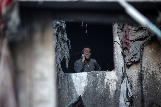 News Themen der Woche KW50 News Bilder des Tages Israeli Attacks On Gaza A Palestinian inspects the damage at the site of an Israeli strike on a house amid the Israel-Hamas conflict at the Nuseirat refugee camp in the central Gaza Strip on December 13, 2024. Gaza Palestine  Copyright: xMajdixFathix originalFilename: fathi-notitle241213_npEza.jpg