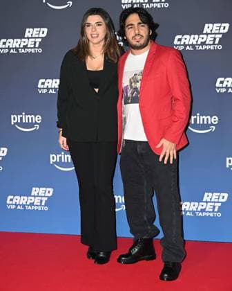 Milan, Italy: Milan, Red Carpet Vip Al Tappeto. in the photo: Max Angioni with his partner Milan Italy  - ZUMAp169 20241218_zea_p169_013 Copyright: xManuelexMangiarottix