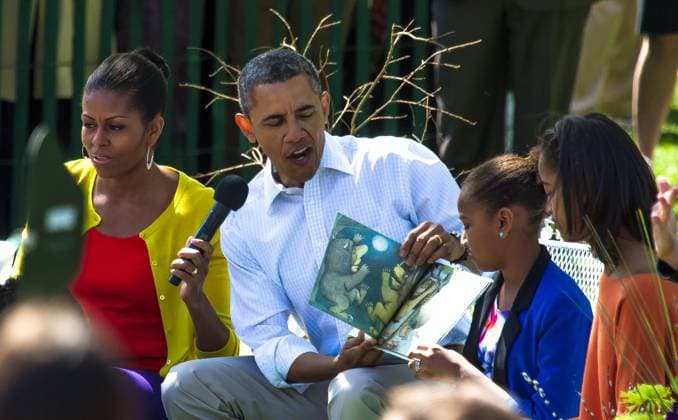 Obamas Host 134th Annual White House Egg Roll (April 9, 2012) Barack and Michelle Obama join daughters Sasha and Malia in reading books to kids. In photo, President Obama reads from Maurice Sendak s Where the Wild Things Are. The 134th annual White House Egg Roll attracted over 30,000 visitors to the White House South Lawn for a day of racing, reading and fun on Monday, April 9, 2012. The theme of this year s egg roll was Let s Go, Let s Play, Let s Move! which was modeled after the First Lady s Let s Move! campaign. (Photo by Jeff Malet) Washington DC United States of America EDITORIAL USE ONLY Copyright: xx JeffxMaletx jmpphotos012988