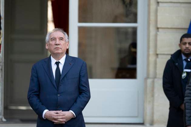 News Themen der Woche KW52 News Bilder des Tages PM Bayrou Observes A Minute Of Silence - Paris France s Prime Minister Francois Bayrou stands at attention as he observes a minute of silence as part of an official day of mourning for the victims of Cyclone Chido which hit the archipelago on the French Indian Ocean territory of Mayotte a week ago, at The Hotel Matignon in Paris on December 23, 2024. Photo by Eliot Blondet ABACAPRESS.COM Paris France  Copyright: xBlondetxEliot ABACAx