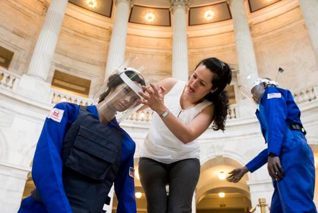 Halo Trust Land Mine Exhibit UNITED STATES - MAY 6: Claudia DelGado, of the Halo Trust, helps set up mannequins for an exhibit in the Russell Senate Office Building on Monday, May 6, 2013, on ridding the world of land mines. Prince Harry will officially launch HALOÕs land mine exhibition on May 9th, as part of his visit to the United States. (Photo By Bill Clark CQ Roll Call) Washington DC United States EDITORIAL USE ONLY Copyright: x x2013xCQxRollxCallx BillxClarkx rollcallpix076356