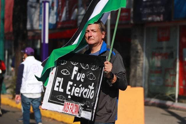 Relatives of the 43 missing students from Ayotzinapa Demonstration A person taking part during a demonstration for the 43 missing students from Ayotzinapa from the Glorieta de Peralvillo to the Basilica of Guadalupe. on December 26, 2024 in Mexico City, Mexico. (Photo by Carlos Santiago Eyepix Group). Copyright: xCarlosxSantiago xEyepixxGroupx CS_26122024_139677