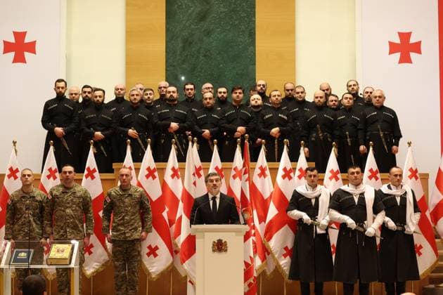 News Themen der Woche KW52 News Bilder des Tages (241229) -- TBILISI, Dec. 29, 2024 -- Mikheil Kavelashvili speaks during his swearing-in ceremony held at the Parliament building in Tbilisi, Georgia, Dec. 29, 2024. Kavelashvili was sworn in as Georgia s sixth president in a ceremony held at the Parliament building on Sunday, Interpressnews reported. Among the people attending the inauguration were key members of the government and Kavelashvili s family, the news agency reported. ( Handout via Xinhua) GEORGIA-TBILISI-NEW PRESIDENT-SWEAR IN GeorgianxParliament 