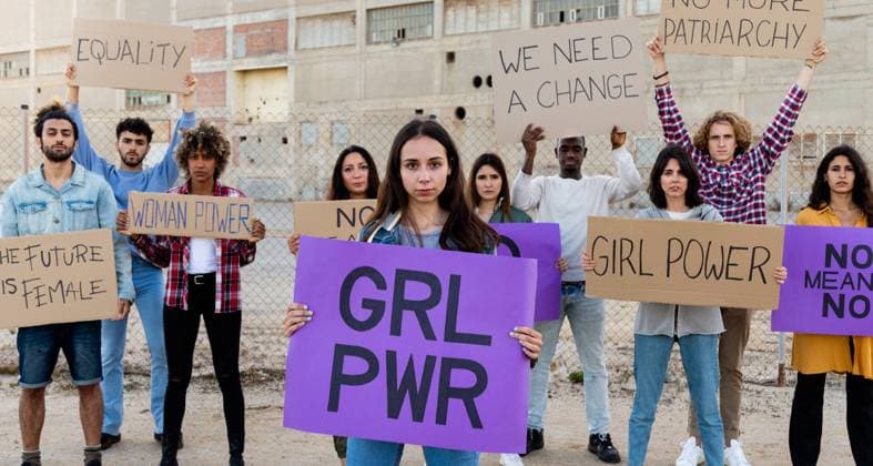 Panoramic image of multiracial protesters holding protest signs in a woman s rights demonstration. Horizontal banner. Feminism concept., model released, , 43944030.jpg, woman, multiracial, man, hold, protest, sign, women, right, demonstration, panoramic, horizontal, looking at camera, feminism, march, social, movement, fight, equality, confidence, banner, purple, signboard, empowerment, group, street, womans day, no means no, future, female, activist, girl, power, stand, togetherness, unity, community, message, placard, change, african american, hispanic, caucasian, walk, freedom, activism, daytime, outside, people RECORD DATE NOT STATED