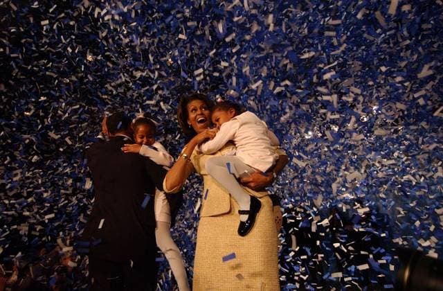 Michelle Obama U.S. Senator-elect Barack Obama, with daughter Malia, wife Michelle and daughter Sasha, wave to supporters at his victory celebration Nov. 2, 2004 at the at the Hyatt Regency Hotel in Chicago. (Jason Wambsgans Chicago Tribune TNS) Chicago IL USA EDITORIAL USE ONLY Copyright: xx 1160316 JasonxWambsgansx krtphotoslive704508