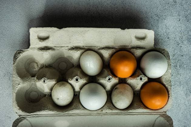 Cooking concept with vintage paper container full of eggs , 44656762.jpg, background, bake, baking, bowl, bright, ceramic, concrete, container, cooking, copy space, decoration, easter, egg, egg shaped, feather, festive, food, holder, holiday, nest, raw, stoneware RECORD DATE NOT STATED