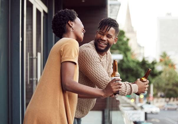 Shot of an affectionate your couple drinking beer while bonding on a balcony outdoors., model released, , 45226086.jpg, partner, exclusive, woman, man, couple, female, young, people, home, natural, happy, male, african, love, smiling, standing, house, looking, 20s, outside, view, real, two, casual, ethnic, lifestyle, care, day, together, modern, copy space, authentic, drink, romance, candid, beer, relaxed, carefree, adults, informal, bottle, wife, content, husband, dating, positive, leisure, cheerful, balcony, relationship RECORD DATE NOT STATED
