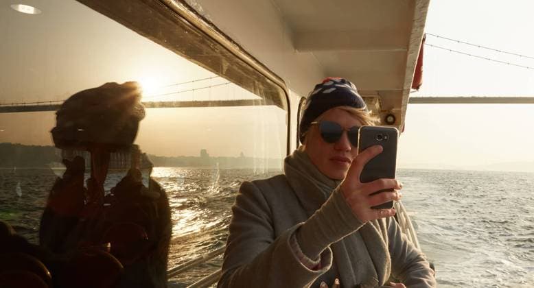 Young amazing woman outdoors on boat in sea take a selfie by mobile phone. Spring, model released, , 45600568.jpg, water, woman, summer, smiling, smartphone, selfie, sea, yacht, photo, phone, mobile, make, young, cruise, beautiful, boat, portrait, lifestyle, lady, happiness, glamour, female, camera, blue, blond, background, attractive, adult, tourist, cell, posing, nature, telephone, making, mobile phone, wind, marina, standing, technology, ship, pretty, sunglasses, look, photographing, smart phone, app, outdoors, photography, pier, port RECORD DATE NOT STATED