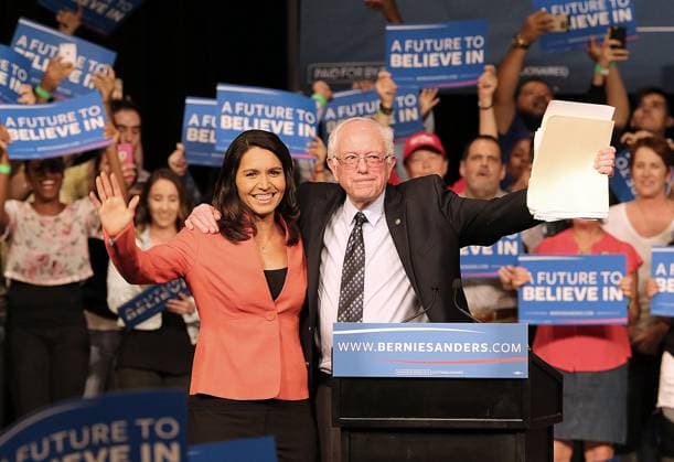 LA Supervisor Janice Hahn and presidential candidate Tulsi Gabbard oppose Coliseum name change Tulsi Gabbard, left, with Sen. Bernie Sanders during the 2016 Democratic presidential campaign. Now a presidential candidate for the 2020 presidency, Gabbard spoke out against a $69-million deal to let United Airlines put its name on the Los Angeles Memorial Coliseum. (Pedro Portal El Nuevo Herald TNS) Miami FL USA EDITORIAL USE ONLY Copyright: xx 1301836 PEDROxPORTALx krtphotoslive859215