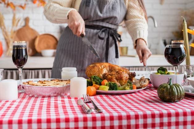 Happy Thanksgiving Day. Autumn feast. Woman celebrating holiday cooking traditional dinner at kitchen with turkey, vegetables and pumpkin pie, cutting, model released, , 47120796.jpg, thanksgiving, dinner, turkey, decorate, pie, woman, pumpkin, cook, home, kitchen, autumn, holiday, celebration, happy, cut, food, adult, event, women, people, table, tradition, fall, caucasian, meals, happiness, fun, cheerful, eating, greetings, november, crops, girl, celebrate, dining, feast, party, day, thankful, prepare, housewife, house, scape, traditional, closeup, veggie, healthy, hands, chicken RECORD DATE NOT STATED