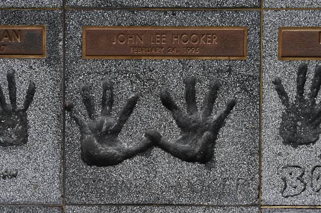 Handprints of John Lee Hooker on the rock walk in the entrance to the Guitar Center Music Store on Sunset Boulevard, Hollywood, Los Angeles, California, USA *** Handprints of John Lee Hooker on the rock walk in the entrance to the Guitar Center Music Store on Sunset Boulevard, Hollywood, Los Angeles, California, USA