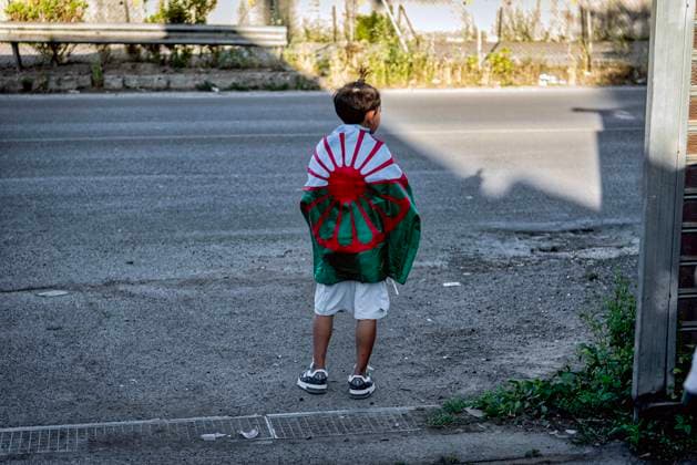 Presentation of the Transnational Manifesto of the Romani Community for Europe ROME, ITALY - MAY 23: A Romani girl with the Roma flag during the presentation of the Transnational Manifesto of the Romani Community for Europe at the Roma Camp in Via dei Gordiani on May 23, 2024 in Rome, Italy. Rome Italy Copyright: xStefanoxMontesix