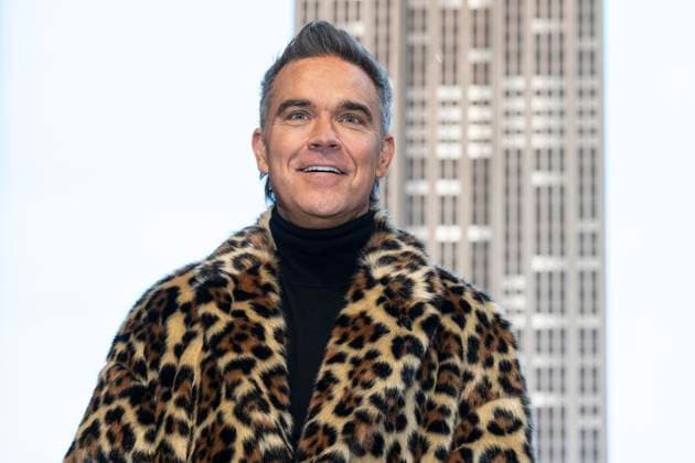 January 14, 2025, New York, New York, USA: Robbie Williams visits the Empire State Building in New York on January 14, 2025 to celebrate the release of Better Man distributed by Paramount Pictures in the USA New York USA - ZUMAr339 20250114_znp_r339_014 Copyright: xLevxRadinx