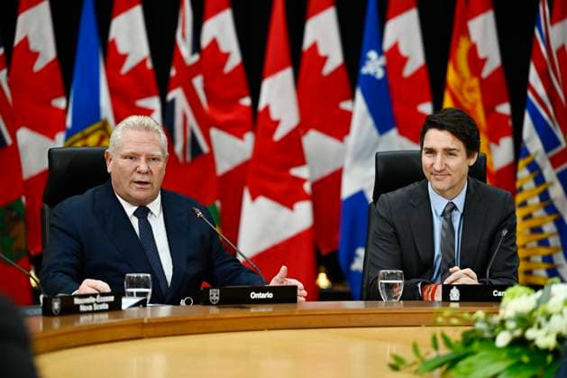 January 15, 2025, Ottawa, On, Canada: Ontario Premier Doug Ford, left, speaks, as Prime Minister Justin Trudeau looks on during a first ministers meeting in Ottawa on Wednesday, Jan. 15, 2025. Ottawa Canada  - ZUMAc35_ 20250115_zaf_c35_059 Copyright: xJustinxTangx