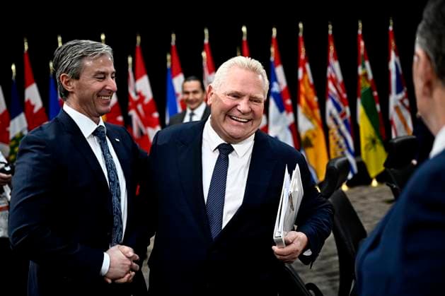 January 15, 2025, Ottawa, On, Canada: Ontario Premier Doug Ford shakes hands with Nova Scotia Premier Tim Houston before a first ministers meeting in Ottawa, on Wednesday, Jan. 15, 2025. Ottawa Canada  - ZUMAc35_ 20250115_zaf_c35_087 Copyright: xJustinxTangx