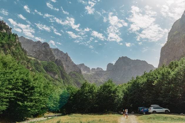 A view of the accursed mountains in the Grebaje Valley. Prokletije, also known as the Albanian Alps and the Accursed Mountains, is a mountain range on the Balkan peninsula, extending from northern Albania to Kosovo and eastern Montenegro , 47834212.jpg, mountain, albania, mountains, balkan, prokletije, range, accursed mountains, natural, nature, outdoor, panorama, peak, scenery, scenic, sky, summer, the balkans, tourism, travel, tree, vacation, landscape, holiday, hill, hiking, adventure, albanian alps, alpine, autumn, background, forest, europe, alps, climbing, top, green, grass, balkans, grebaje, blue, cloud, montenegro, clouds, valley, foggy, beautiful, view, dinaric alps, rock, eastern RECORD DATE NOT STATED