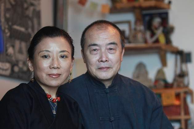 Wang Lixiong and his Tibetan wife Tsering Woeser pose for a photograph at home in Beijing. 17DEC13 == Photo by Simon Song == Beijing - China EDITORIAL USE ONLY  Copyright: xx MER1401161253328874 SimonxSongx scmpphotos735392