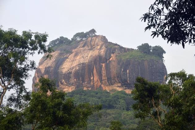(250118) -- DAMBULLA, Jan. 18, 2025 -- This photo shows the Sigiriya Lion Rock, a popular tourist spot, in Dambulla, Sri Lanka, Jan. 17, 2025. The ancient city of Sigiriya was inscribed as a world heritage site by United Nations Educational, Scientific and Cultural Organizations (UNESCO) in 1982. (Photo by Xinhua) SRI LANKA-DAMBULLA-SIGIRIYA LION ROCK AjithxPerera 