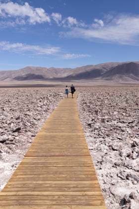 cuuple walking over salt and volcanic field San Pedro de Atacama, Antofagasta, Chile R_NEAN25011740-1628776-01