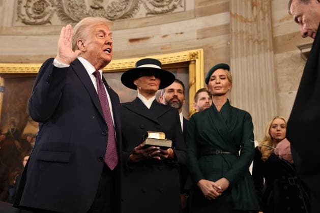 Trump and Vance Swearing-In at the US Capitol - DC President-elect Donald Trump takes the oath of office from Chief Justice John Roberts as Melania Trump, Ivanka Trump, Donald Trump Jr. and Eric Trump look on during inauguration ceremonies in the Rotunda of the U.S. Capitol on January 20, 2025 in Washington, DC. Donald Trump takes office for his second term as the 47th president of the United States. Photo by Chip Somodevilla Pool CNP ABACAPRESS.COM Washington DC United States  Copyright: xCNP ABACAx