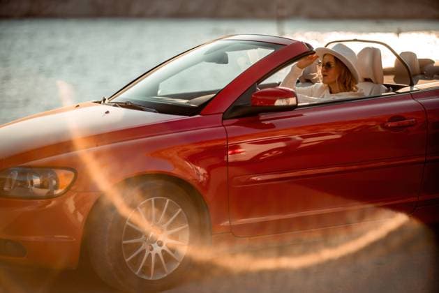 Outdoor summer portrait of stylish blonde woman driving red car convertible. Fashionable attractive woman with blond hair in a white hat in a red car. Sunny bright colors taken outdoors against the sea, model released, , 48402456.jpg, red, car, convertible, vehicle, female, stylish, hat, blonde, fair, portrait, hair, attractive, outdoors, woman, adult, pose, posing, pretty, sunglasses, model, drive, fashion, automobile, person, style, long, people, auto, street, nice, trip, sea, elegance, traveler, beautiful, glamour, background, rocks, cute, driver, women, lady, tourism RECORD DATE NOT STATED