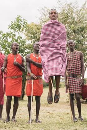 Group of Maasai Men in Traditional Dance Outdoors in Black and White Kenia, Ituri, Democratic Republic of the Congo R_VAFF250120A-1636000-01 EDITORIAL USE ONLY