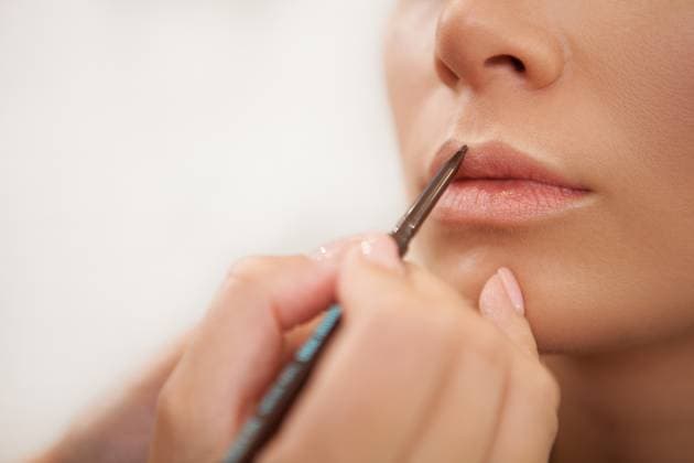 Cropped close up of a makeup artist using lip pencil on the lips of a woman, model released, , 48664230.jpg, makeup, makeup artist, lips, cosmetics, cosmetic, apply, professional, artist, lipstick, skin, lipgloss, lip pencil, red, product, liquid, gloss, aesthetic, augmentation, profession, occupation, skintone, matifying, beauty, industry, gorgeous, attractive, pomade, model, preparation, celebration, glowup, service, woman, client, salon, studio, photoshoot, lifestyle, beautiful, brush, cosmetology, elegant, fashion, female, healthy, glamorous, face, eyebrows, nude, natural RECORD DATE NOT STATED