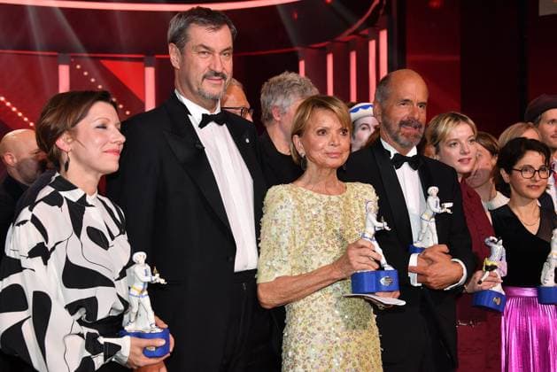 Mareike Engelhardt, Markus Soeder, Uschi Glas und Christoph Maria Herbst auf der Buehne bei der Verleihung Bayerischer Filmpreis am 24.01.2025 im Prinzregententheater in Muenchen Bayerischer Filmpreis 2025 in Muenchen