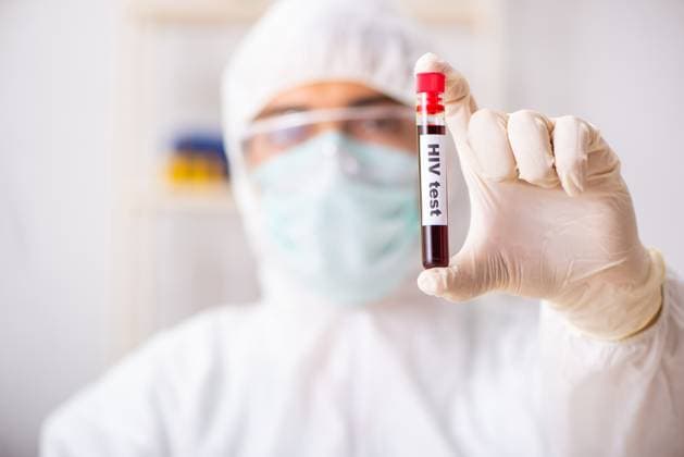 Young handsome lab assistant testing blood samples in hospital ,model released, Symbolfoto  Copyright: xZoonar.com ElnurxAmikishiyevx 13126944 ,model released, Symbolfoto ,property released