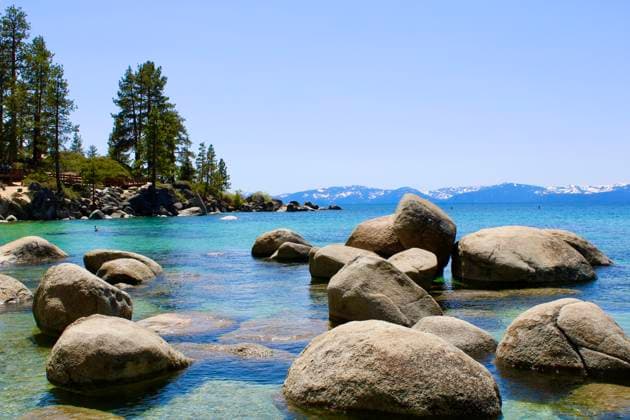 Rocks submerged and on the water of Lake Tahoe South Lake Tahoe, California, United States R_PNXA250120-1628170-01
