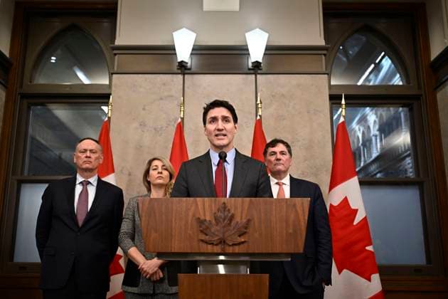 February 1, 2025, Ottawa, Canada: Prime Minister JUSTIN TRUDEAU addresses media following the imposition of a raft of tariffs by President Trump against Canada, Mexico and China, in Ottawa. Minister of Public Safety David McGuinty, left to right, Global Affairs Minister Melanie Joly and Minister of Governmental Affairs Dominic LeBlanc look on. Ottawa Canada  - ZUMAc35_ 20250201_zaf_c35_127 Copyright: xJustinxTangx