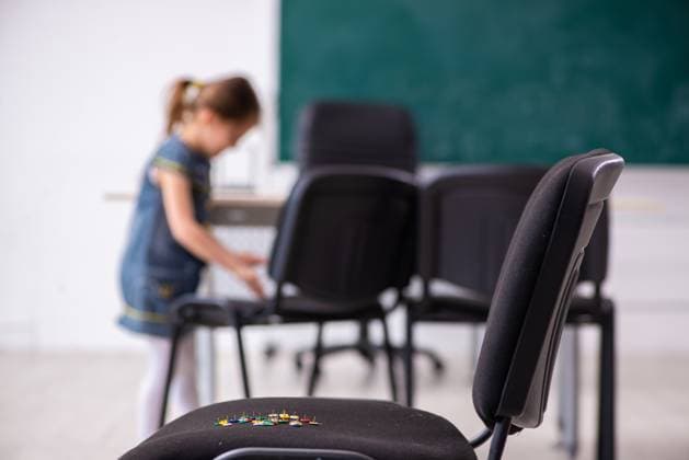 School prank with sharp thumbtacks on chair ,model released, Symbolfoto  Copyright: xZoonar.com ElnurxAmikishiyevx 16318303 ,model released, Symbolfoto ,property released
