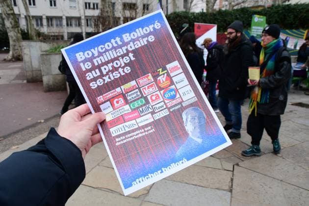 February 1, 2025, Lyon, Rhone, France: A protester holds a poster during the demonstration against businessman Vincent Bollore. Demonstration was held against French businessman Vincent BollorÃ in Lyon. Lyon France - ZUMAs197 20250201_aaa_s197_400 Copyright: xRomainxDoucelinx