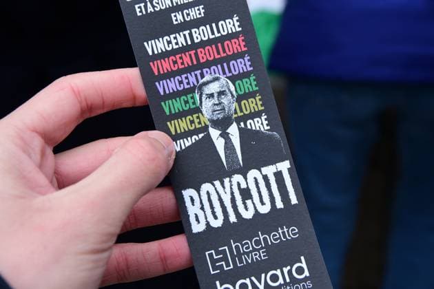 February 1, 2025, Lyon, Rhone, France: A protester holds a poster during the demonstration against businessman Vincent Bollore. Demonstration was held against French businessman Vincent BollorÃ in Lyon. Lyon France - ZUMAs197 20250201_aaa_s197_401 Copyright: xRomainxDoucelinx