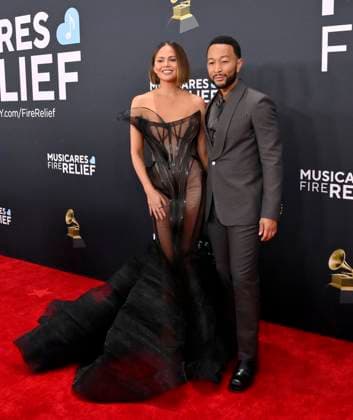 Chrissy Teigen and John Legend arrive for the 67th Annual Grammy Awards at Crypto.com Arena in Los Angeles on February 2, 2025. The awards ceremony will honor the best recordings, compositions, and artists from September 16, 2023, to August 30. 2024, as chosen by the members of the Recording Academy.  LAP20250202259 JIMxRUYMEN