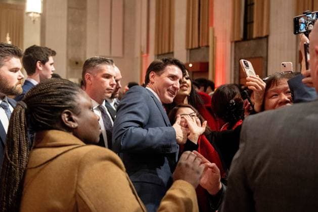 February 4, 2025, Ottawa, On, Canada: An attendee takes a selfie with Prime Minister Justin Trudeau during a Lunar New Year celebration in Ottawa, on Tuesday, Feb. 4, 2025. Ottawa Canada  - ZUMAc35_ 20250204_zaf_c35_097 Copyright: xSpencerxColbyx