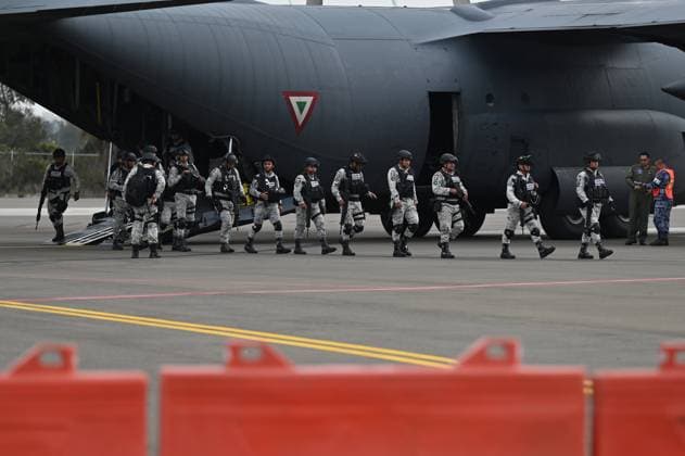 February 4, 2025, Tijuana, Baja California, Mexico: A Mexico s Air Force plane carrying members of the Mexican National Guard arrive at Military Air Base No. 12 near the Tijuana International Airport in Tijuana, Baja California, Mexico, on Tuesday, February 04, 2025. The arrival of MexicoÃ¢â‚¬â ¢s first 300 officers in the border city begins the 10,000 troop deployment President Claudia Sheinbaum had promised US President Donald Trump in exchange for delaying a 25-percent tariff on exported goods for a month with future negotiations to be determined. Tijuana Mexico - ZUMAm180 20250204_zip_m180_012 Copyright: xCarlosxA.xMorenox