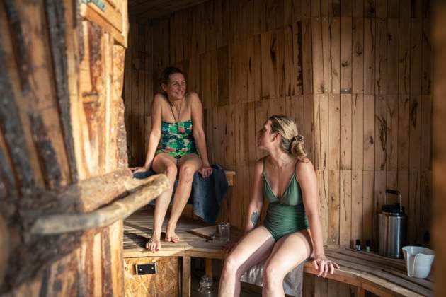 Two Women Enjoying A Rustic Sauna In Denmark Denmark, Copenhagen CR_EMWIXA250115-1633040-01 ,model released, Symbolfoto